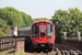 Bombardier London Underground S7 Stock n°21408 sur la District Line (TfL) à Londres (London)